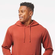 Model wearing Independent Trading Co PRM4500 Unisex Midweight Pigment-Dyed Hoodie
