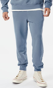 Model wearing Independent Trading Co PRM50PTPD Unisex Pigment-Dyed Fleece Sweatpants