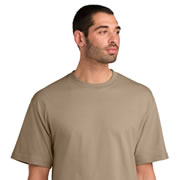 Model wearing District DT6065 Heavyweight Very Important Tee