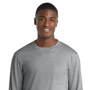 Model wearing Port & Company PC61LSP Long Sleeve Essential Pocket Tee