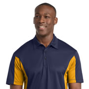 Model wearing Sport-Tek ST655 Side Blocked Micropique Sport-Wick Polo