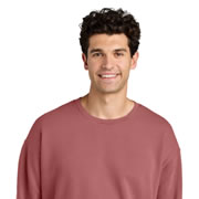 Model wearing Comfort Colors 1466 Unisex Garment-Dyed Lightweight Fleece Crewneck Sweatshirt