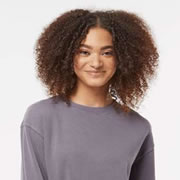 Model wearing Independent Trading Co PRM3500 Unisex Midweight Pigment-Dyed Sweatshirt